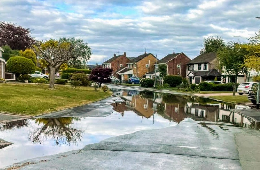 Alsager residents lose water as leak floods road